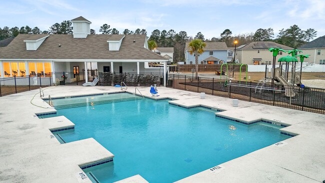 Building Photo - Well-Maintained 4 Bedroom Corner Lot Home in The Palms with Resort-Style Community Amenities