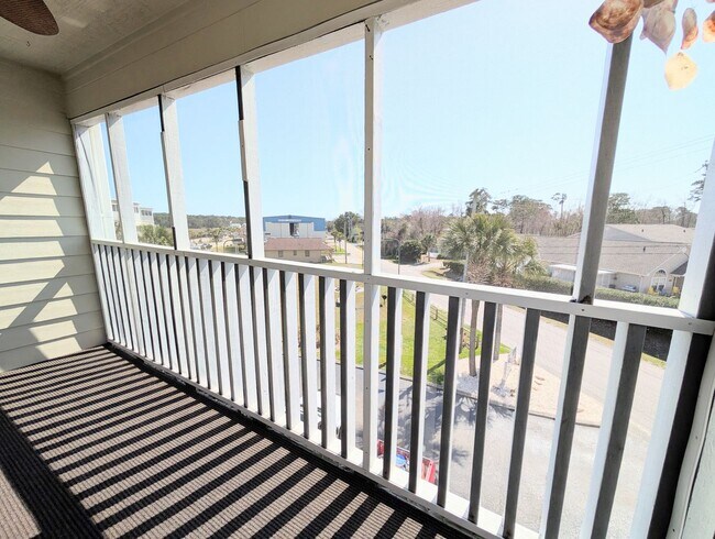 Building Photo - Dreamy Little River Condo — Furnished, Elevator Access, Pool & Marina Nearby!
