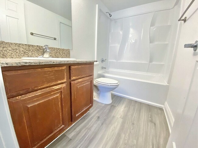 Building Photo - CONDOMINIUM IN A GATED COMMUNITY WITH 2 BE...