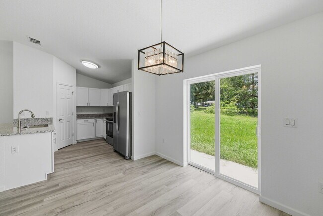 Building Photo - Available Now! New 3/2 Home with Large Backyard and Front Porch