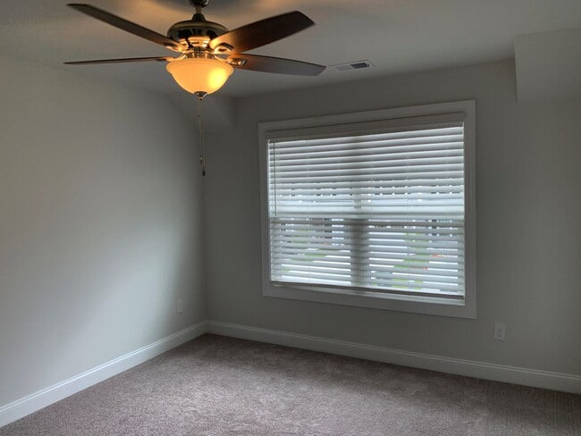 Building Photo - 4 Bedroom, 2.5 Bath, Pet Friendly Town Home with Garage Within Barefoot Resort and Golf! Availabl...