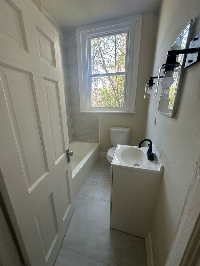 Building Photo - BRAND NEW 2 BEDROOM 1 BATH FIRST FLOOR APARTMENT