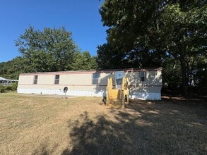 Building Photo - Two bedroom single wide on a private lot!