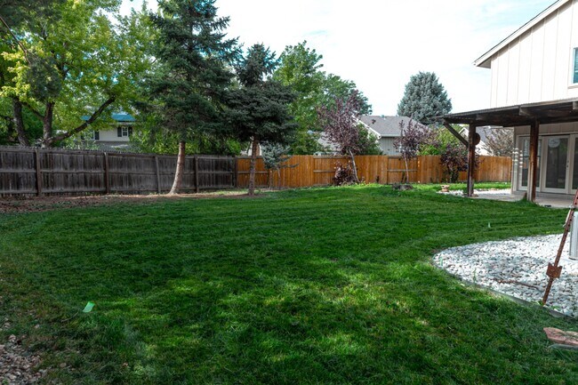 Building Photo - 7355 S Garfield Ct