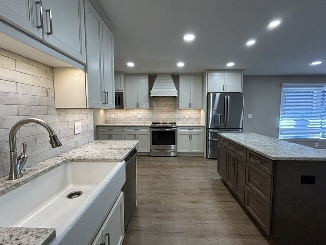 Building Photo - Spacious Brick Ranch Nestled Away — Close to Town!