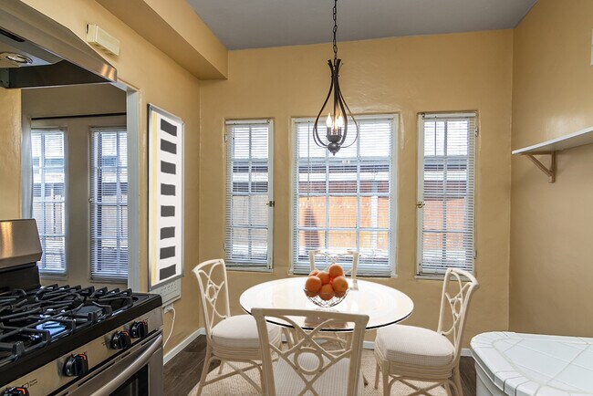Eating area with lots of natural light through many windows - 4015 Edenhurst Ave