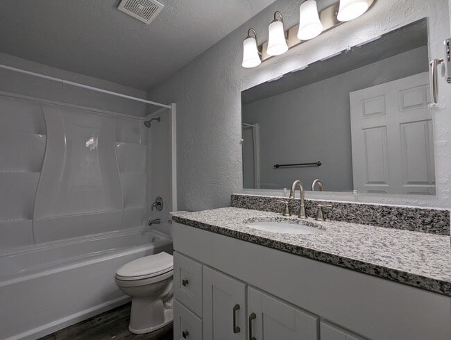 Building Photo - Newly Renovated 2-Bedroom, 1.5-Bath Apartment with Private Patio and On Site Laundry!