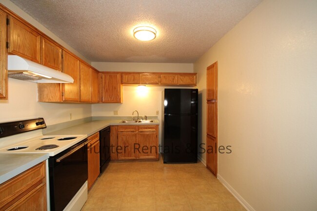 Building Photo - Move South!