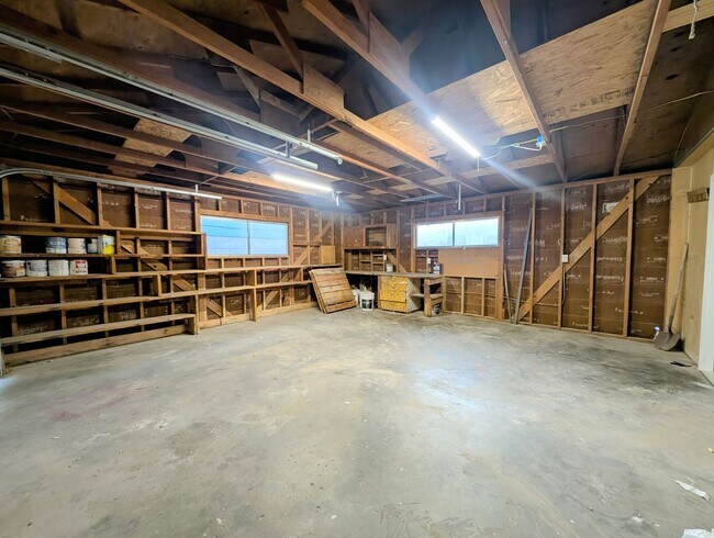 Building Photo - 4-bedroom house with a 2-car garage availa...