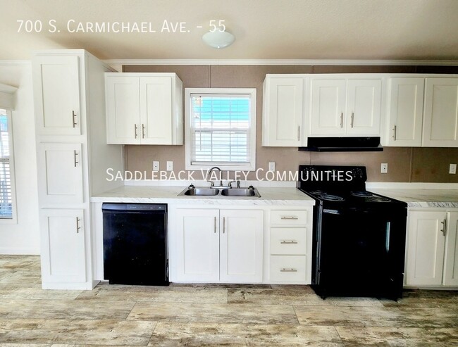 Building Photo - 700 S Carmichael Ave