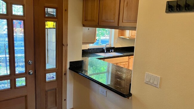 Building Photo - Large home with garage and fenced backyard