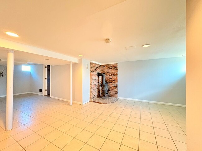 Building Photo - Charming Brick Home with Finished Basement...