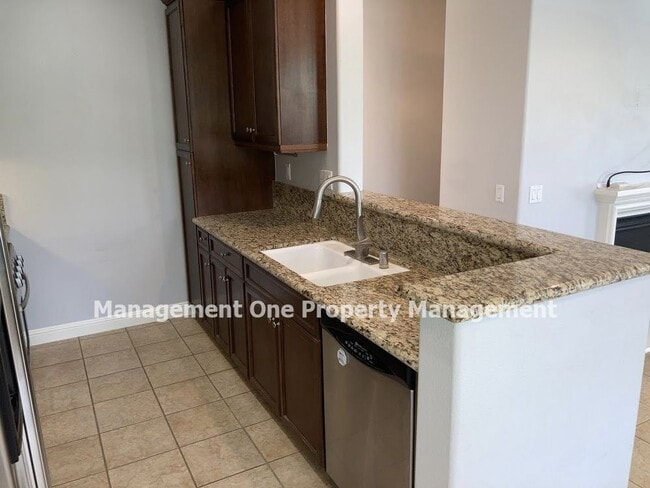 Building Photo - Beautiful Serafina Gated Community Townhome