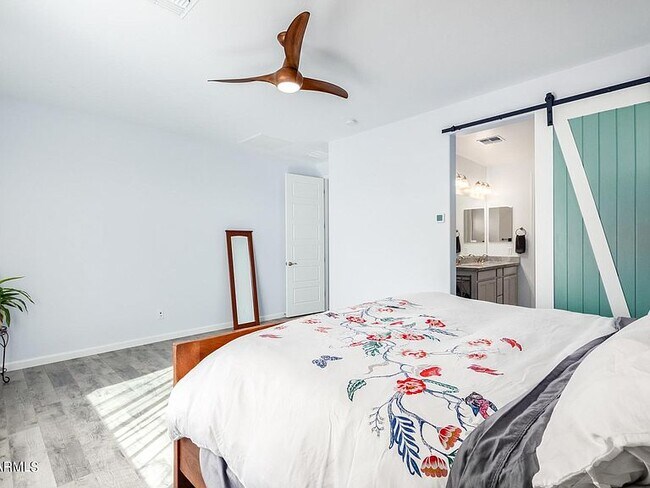 Master Bedroom w/Barn door - 14579 W Dahlia Dr