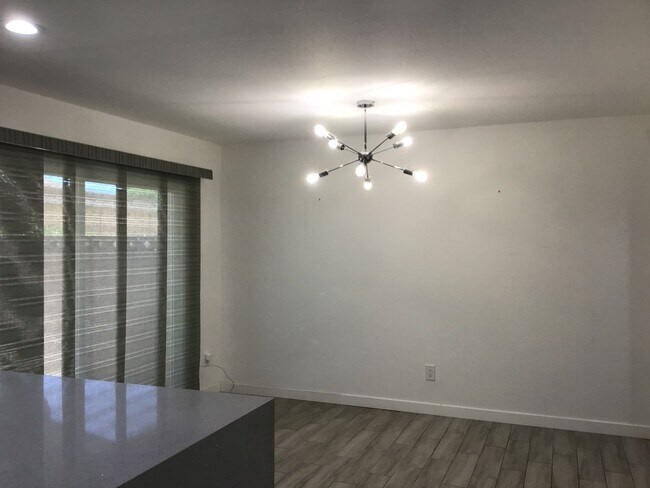 Building Photo - Corner Unit Townhome with Style and Substa...
