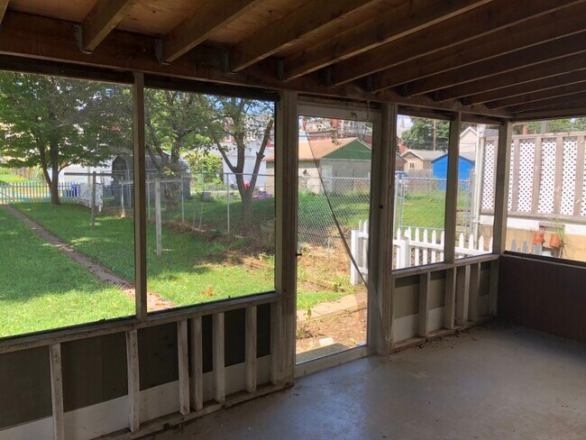 Rear porch and yard - 621-1 Herman Ave