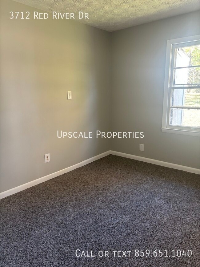 Building Photo - 3712 Red River Dr