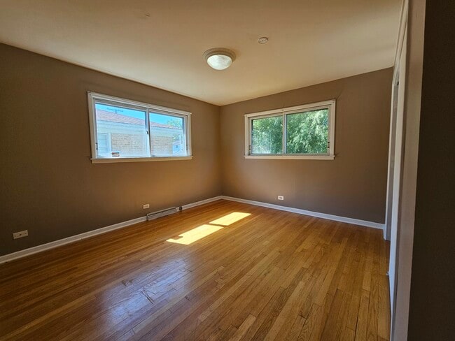 Building Photo - 9924 N Crawford Ave