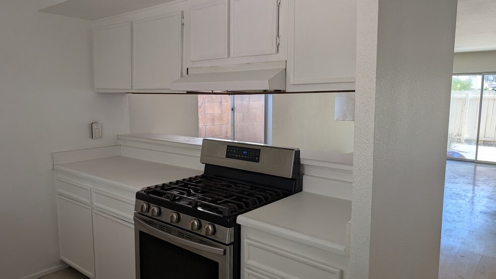 Kitchen Pass Through - 10125 De Soto Ave