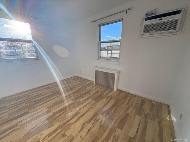 Building Photo - 245-39-24576 76th Ave