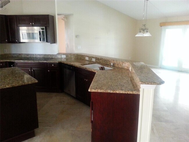 Building Photo - 9149 Palm Tree Dr