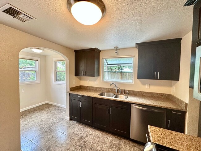 Building Photo - Charming 2-Bedroom, 2- bathroom Home with Bonus Space & Prime Shoreline Location