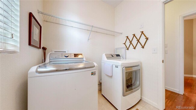 Building Photo - Large 4 bedroom home with a Fully Finished...