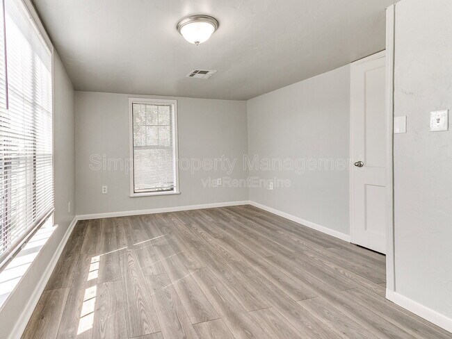 Building Photo - 9706 N Garnett Dr