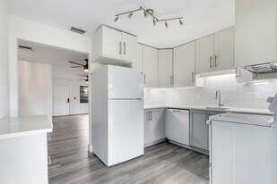 Kitchen looking out to living area - 16320 John Morris Rd