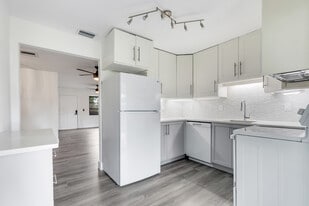 Kitchen looking out to living area - 16320 John Morris Rd
