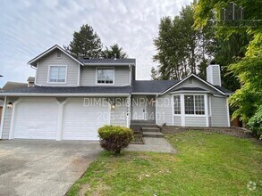 Building Photo - Stylishly Renovated Home with Private Back...