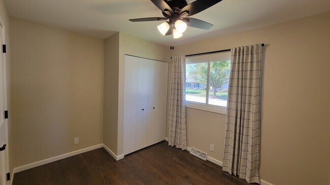Bedroom 1. Perfect for a bedroom, nursery, bunk beds, office or craft room. 4 ft wide closet. - 6305 49th Ave