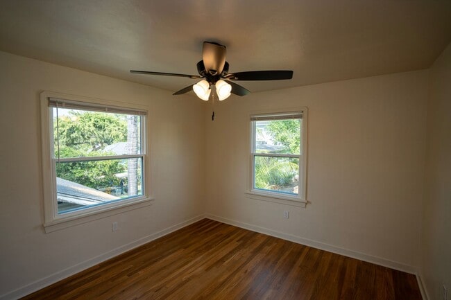 Building Photo - Step into timeless elegance and modern com...