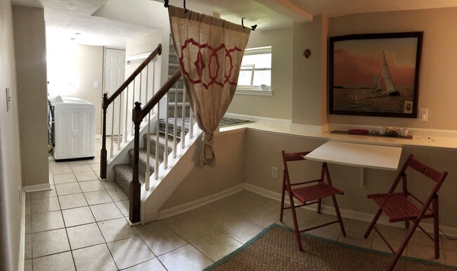 Main view of kitchen/dining and laundry room. - 1502 Pendleton Rd