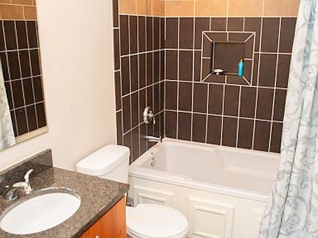 Full bathroom connected to 2nd bedroom. - 300 Van Buren St