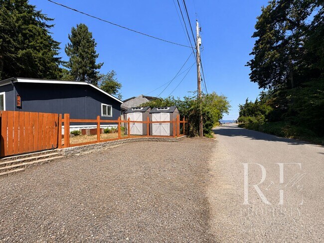 Building Photo - Walk to the Ferry from This Updated Port Orchard Home with Expansive Deck & Gated Yard