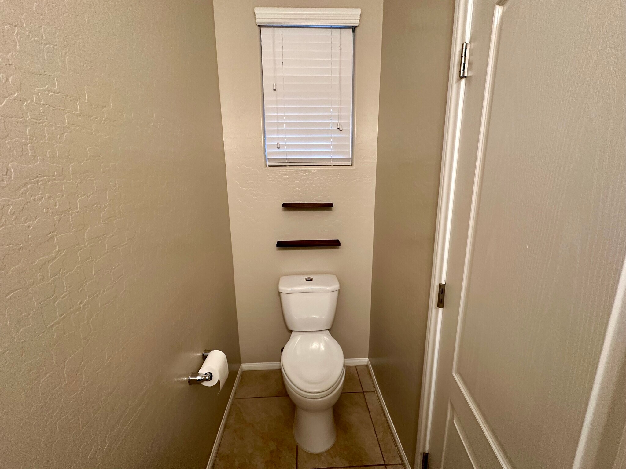 Half Bathroom on 1st Floor - 9341 W Pearblossom Sky Ave