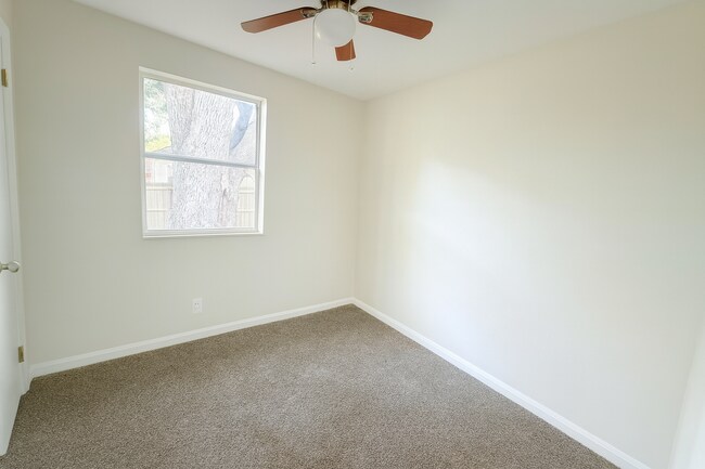 Building Photo - Freshly Updated Home with Bonus Space & Large Fenced Backyard