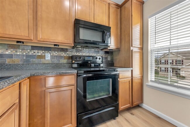 Building Photo - 6303 Spring River Dr