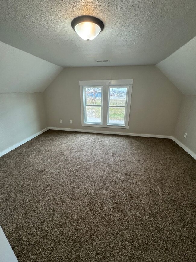 Building Photo - 4 bedroom/1 bath house w/storage building