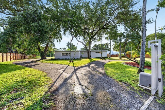 Building Photo - 11665 W Biscayne Canal Rd