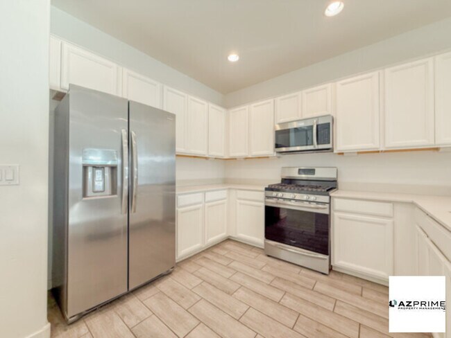 Building Photo - Discover the Essence of Comfort and Style in this Remarkable 4/3 Queen Creek Home!