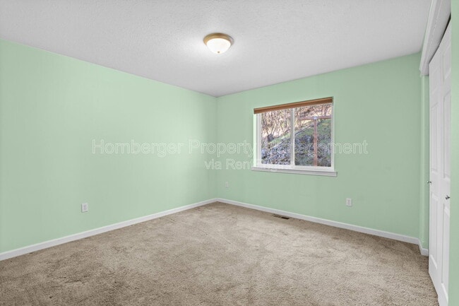 Building Photo - 6929 N Country Homes Blvd