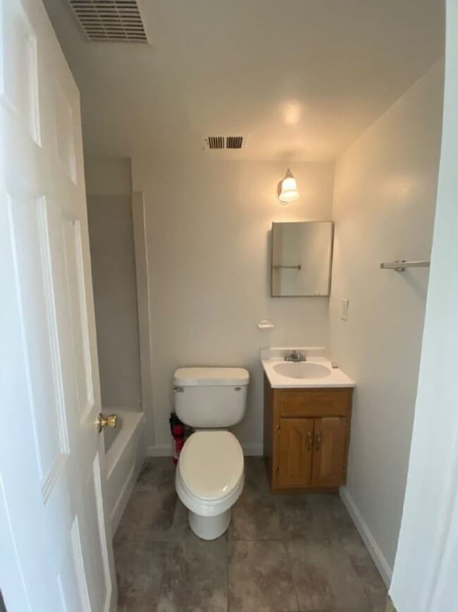 Building Photo - A charming two bedroom one and one half  bath row house located just off New Jersey Ave in the Sh...
