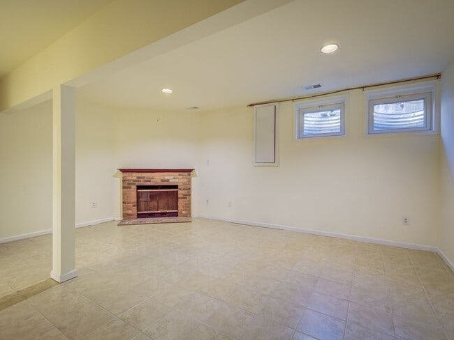 Building Photo - A Lovely Brick-Front Town House