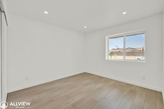 Building Photo - Fully Renovated 4-Bedroom Home with Firepl...