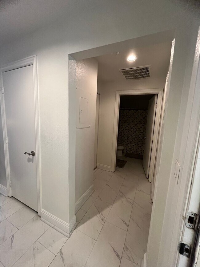 Building Photo - Meridian  Fully FURNISHED Condo with Strip...