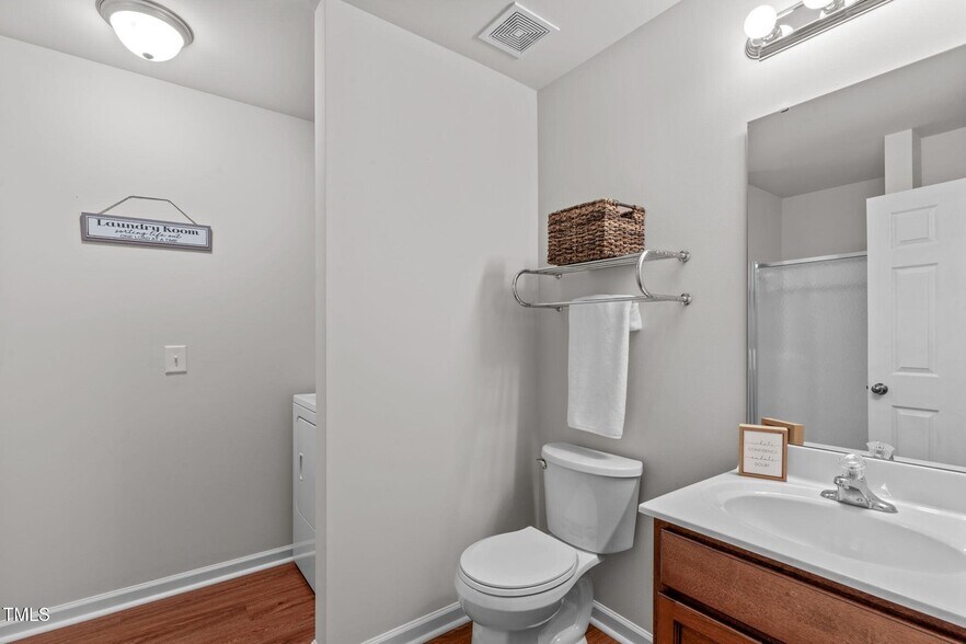 1st floor full bath with laundry - 228 Dove Cottage Ln