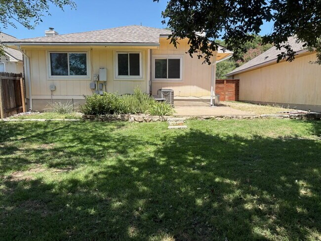 Building Photo - Updated 4-Bedroom 2 Bathroom Austin Home with Beautiful Backyard