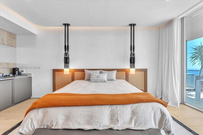 Building Photo - 18975 Collins Ave